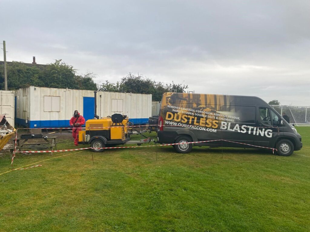 Coating removal on a steel container