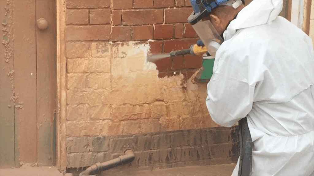 What is the difference between wet and dry sand blasting?